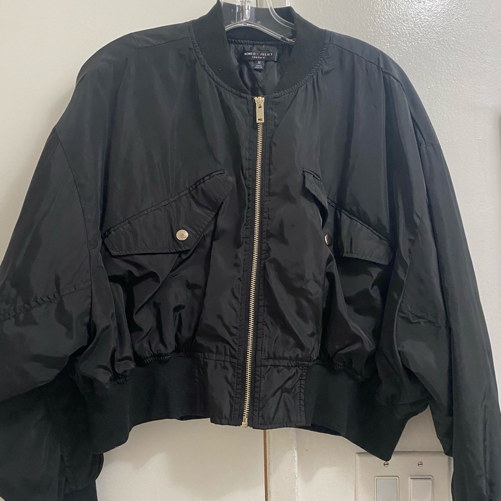 Black puffer jacket.